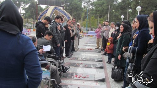 برگزاری مراسم  غبارروبي وعطرافشانی گلزار شهدا به مناسبت گرامیداشت هفته بسیج وشهدای پنجم آذر